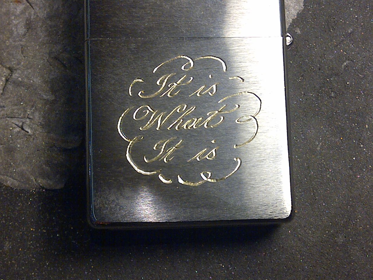 hand engraving onto zippo- this message R150